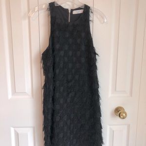 Black polka dot fringe dress. 60’s inspired style